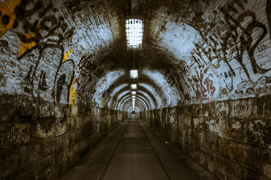 A dark underground tunnel